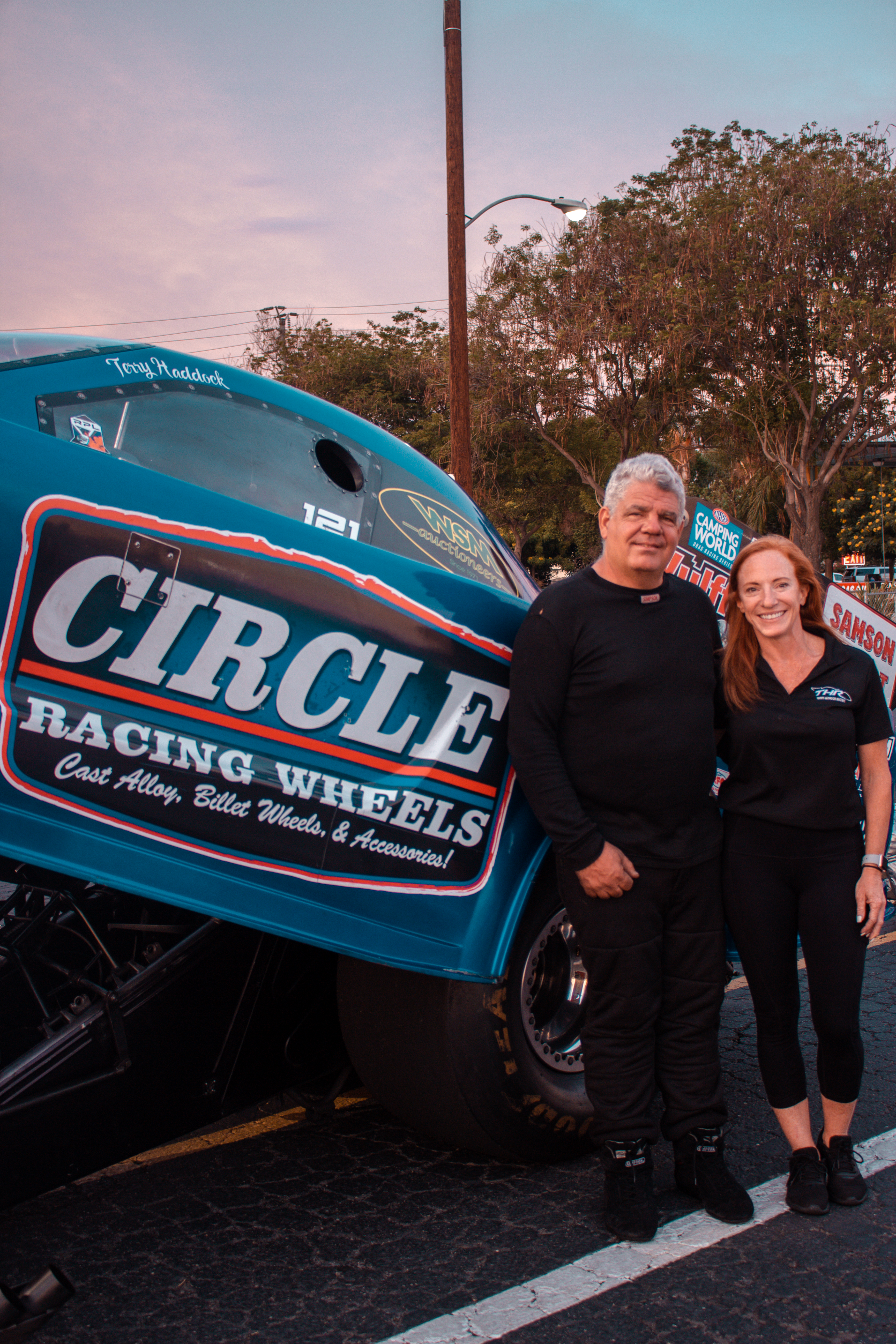 Circle Racing Owners Terry Haddock standing in front of race car
